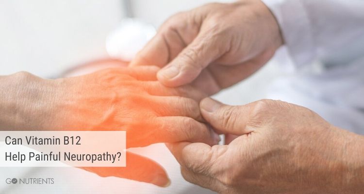 A doctor examines a patients painful hands with neuropathy. 