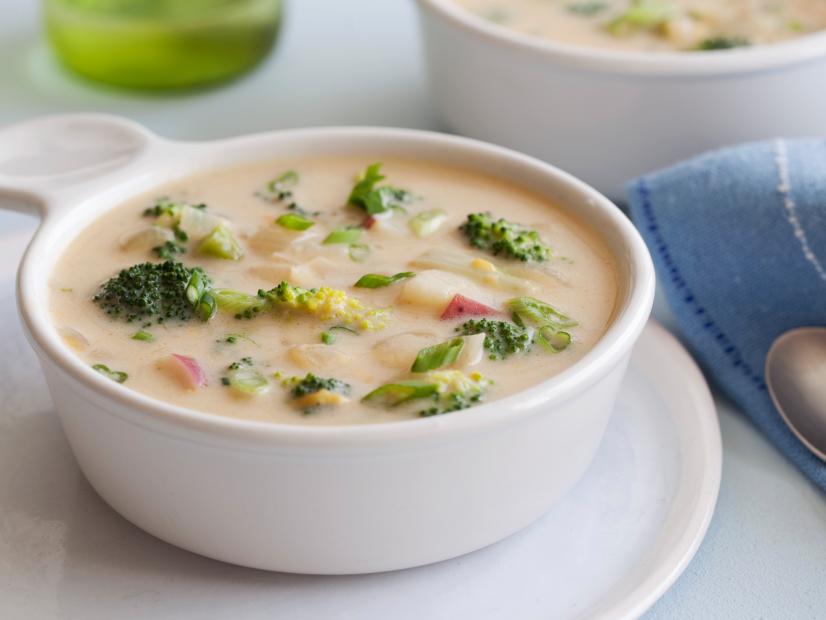 Healthified Broccoli Cheddar soup in a soup bowl.