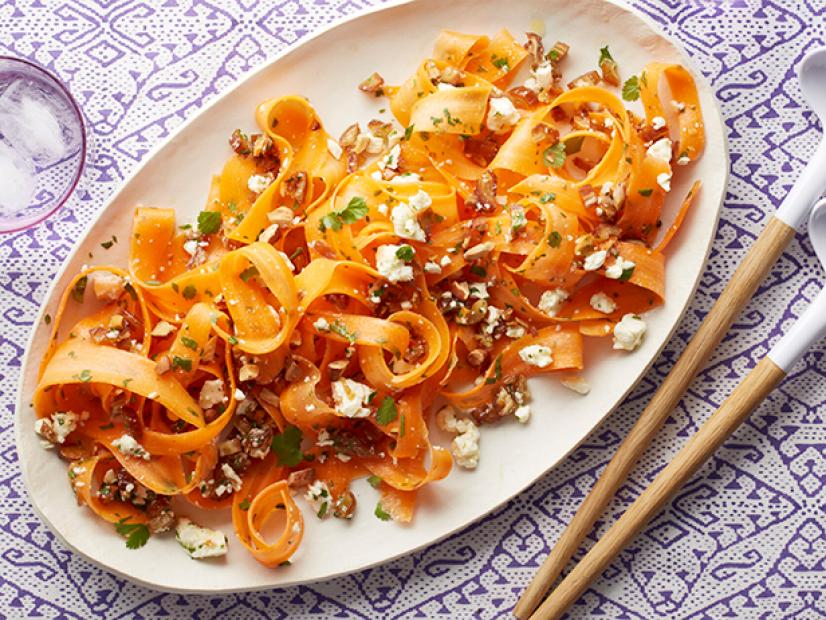 Carrot, Date and Feta Salad plated on an oval dish. 