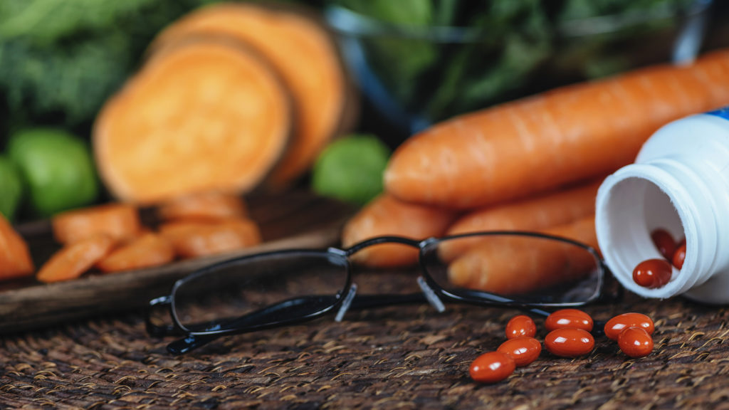 Lutein supplements and vegetables. Lutein is yellow pigment with high quantities of it naturally occurring in green leafy vegetables and some other plants. Lutein is specifically absorbed into eye macula. Studies have found that lutein supplementation may delay age-related macular degeneration.